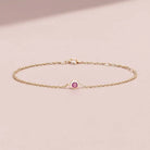Bezel-set pink tourmaline bracelet in 14K yellow gold on adjustable curb chain variant--Sterling silver
