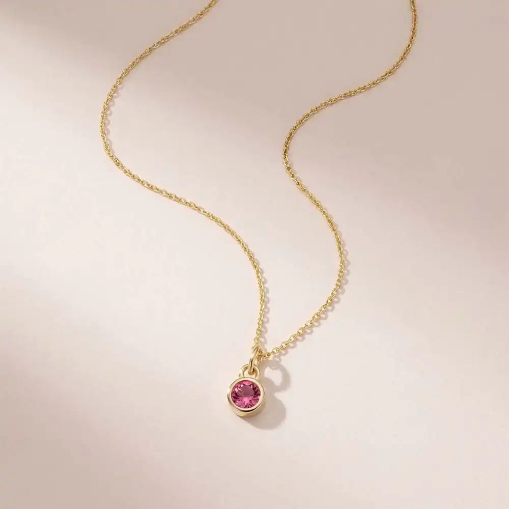 Tourmaline birthstone necklace, featuring a 3mm natural gemstone on a delicate chain