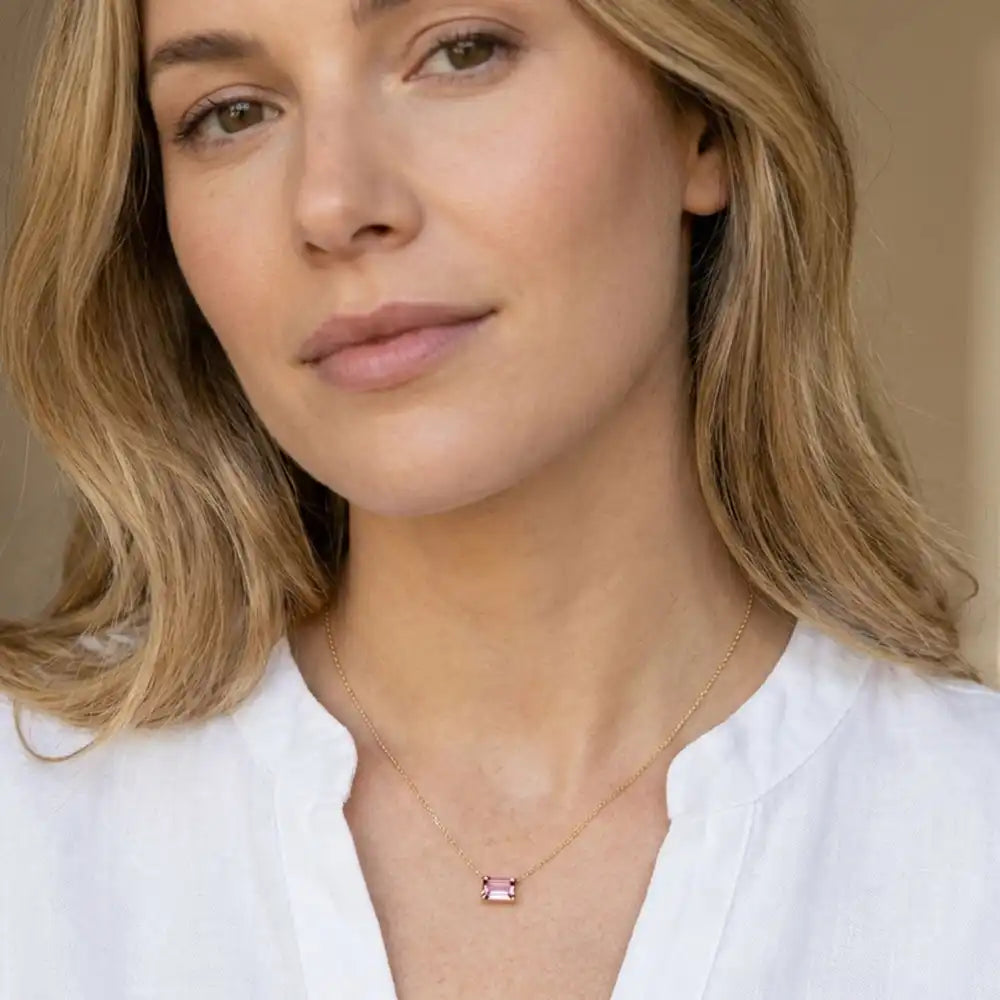Minimalist birthstone necklace featuring a 5x3mm emerald shown on model variant-14K-yellow-gold variant-14K-white-gold variant-14K-rose-gold variant-Sterling-silver