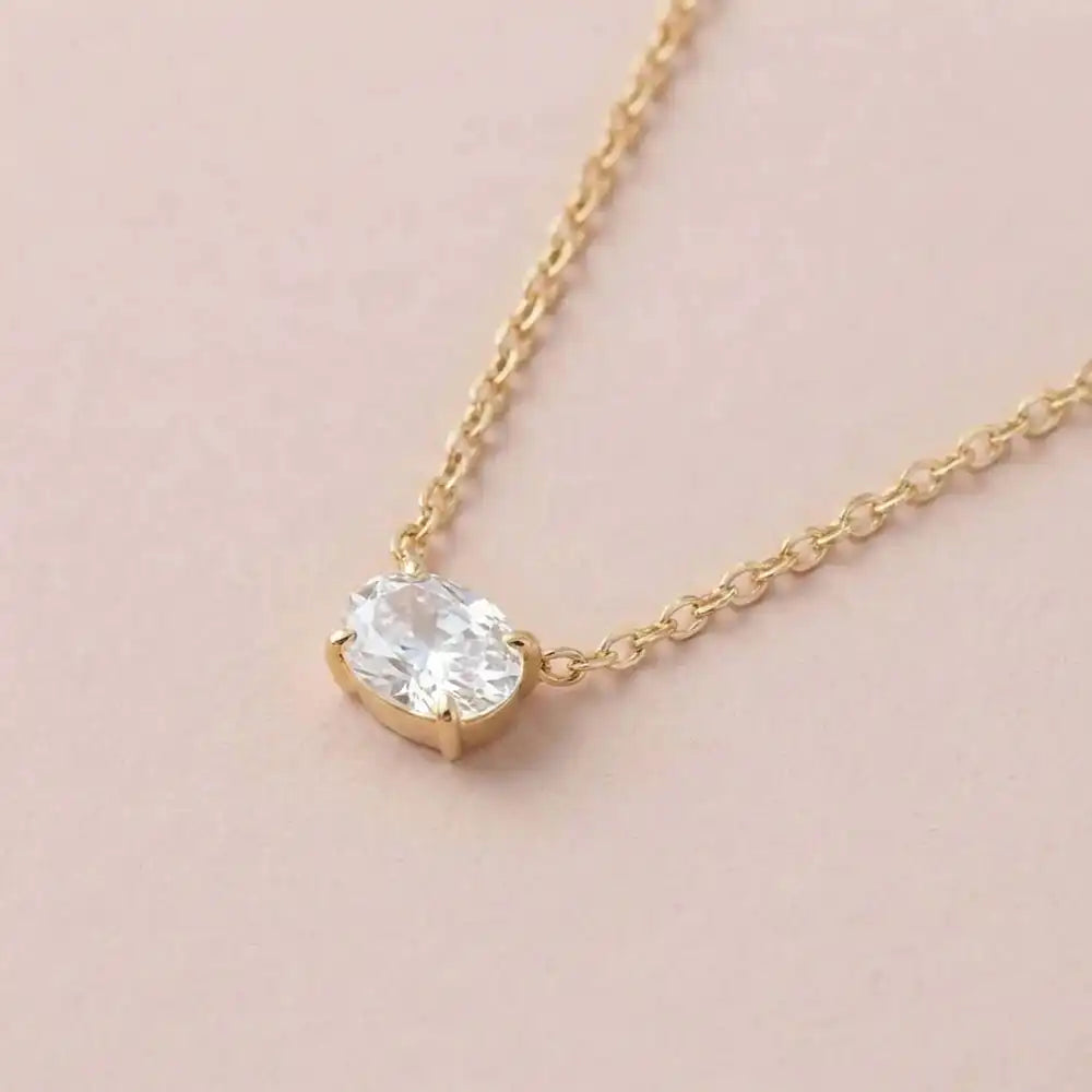 14K white gold east-west necklace with white sapphire gemstone variant--14K-rose-gold variant--14K-white-gold variant--14K-yellow-gold variant--Sterling-silver variant--White-sapphire