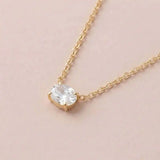 14K white gold east-west necklace with white sapphire gemstone variant--14K-rose-gold variant--14K-white-gold variant--14K-yellow-gold variant--Sterling-silver variant--White-sapphire