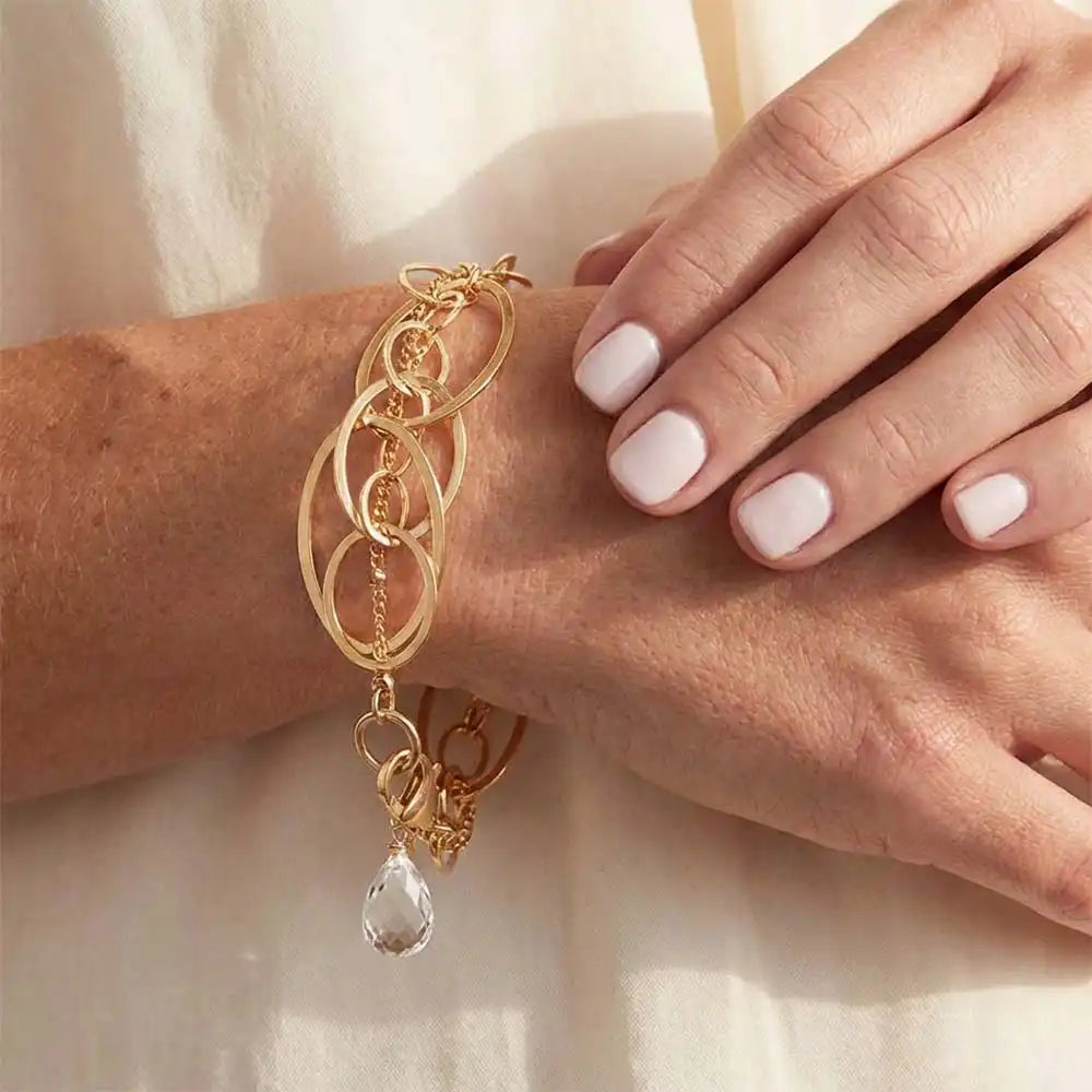 Natural white topaz woven chain bracelet in sterling silver, close-up of setting in gold-fill variant--Gold-fill variant--Sterling-silver variant--Oxidized-sterling-silver variant--White-Topaz