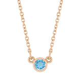 Bezel-set blue zircon birthstone necklace in 14K rose gold, product view variant--14K-rose-gold variant--Zircon