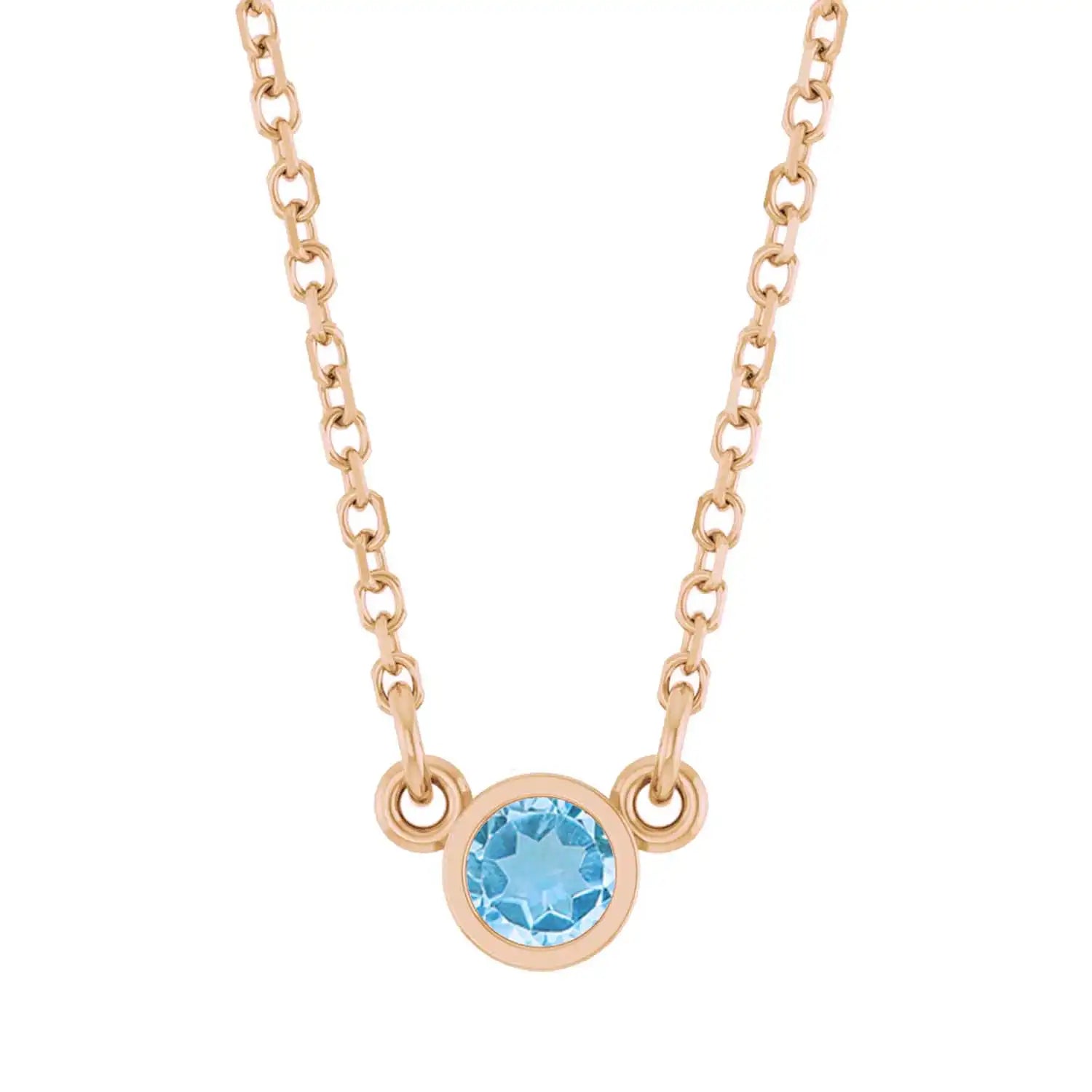 Bezel-set blue zircon birthstone necklace in 14K rose gold, product view