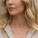 Minimalist zircon necklace featuring a 5x3mm emerald shown on model variant-14K yellow gold variant-14K-white-gold variant-14K rose gold variant-Sterling-silver