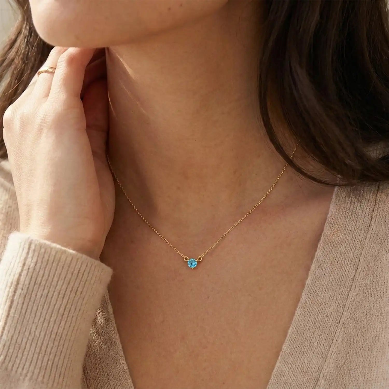 14K gold zircon necklace shown on model variant--14K-rose-gold, variant--14K-yellow-gold, variant--14K-white-gold, variant--Sterling-silver