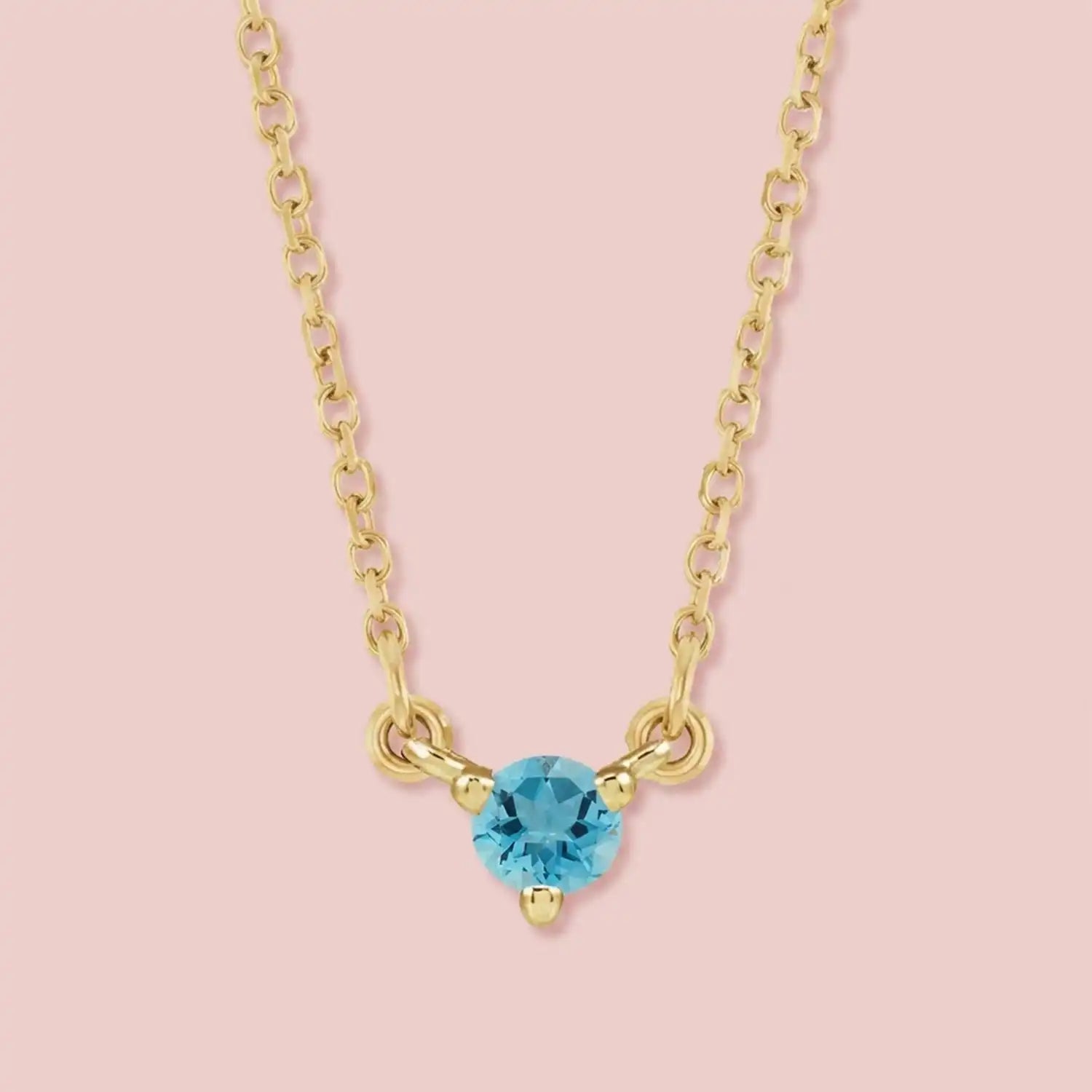 14K gold zircon necklace shown on model variant--14K-rose-gold,  variant--14K-yellow-gold,  variant--14K-white-gold, variant--Sterling-silver