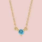 14K gold zircon necklace shown on model variant--14K-rose-gold,  variant--14K-yellow-gold,  variant--14K-white-gold, variant--Sterling-silver