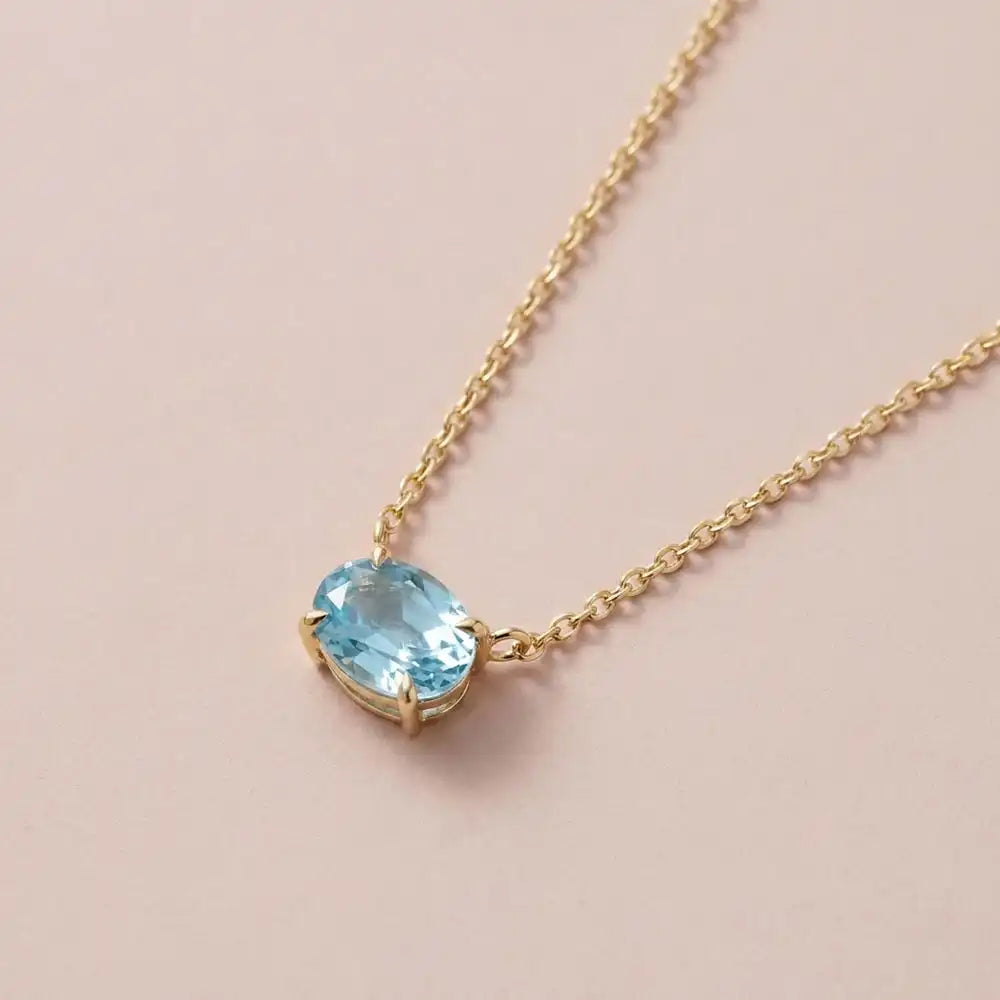 East-west zircon birthstone necklace in 14K yellow gold variant--14K-rose-gold variant--14K-white-gold variant--14K-yellow-gold variant--Sterling-silver variant--Zircon