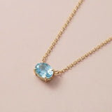East-west zircon birthstone necklace in 14K yellow gold variant--14K-rose-gold variant--14K-white-gold variant--14K-yellow-gold variant--Sterling-silver variant--Zircon