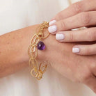 Natural amethyst woven chain bracelet in sterling silver, close-up of setting in gold-fill