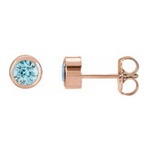 Aquamarine bezel stud earrings side view in 14K rose gold variant--14K-rose-gold