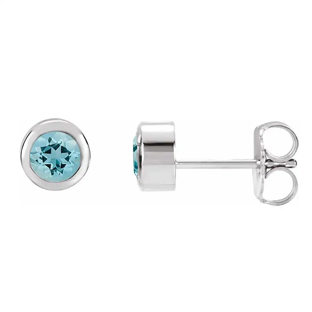 Aquamarine bezel stud earrings side view in 14K white gold