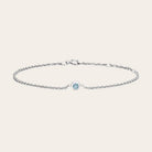 Bezel-set birthstone bracelets displayed together. variant--14K white gold
