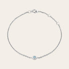 Model wearing bezel-set birthstone bracelet. variant--14K rose gold