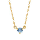 Elegant necklace in 14K yellow gold with dainty round aquamarine birthstone charm.