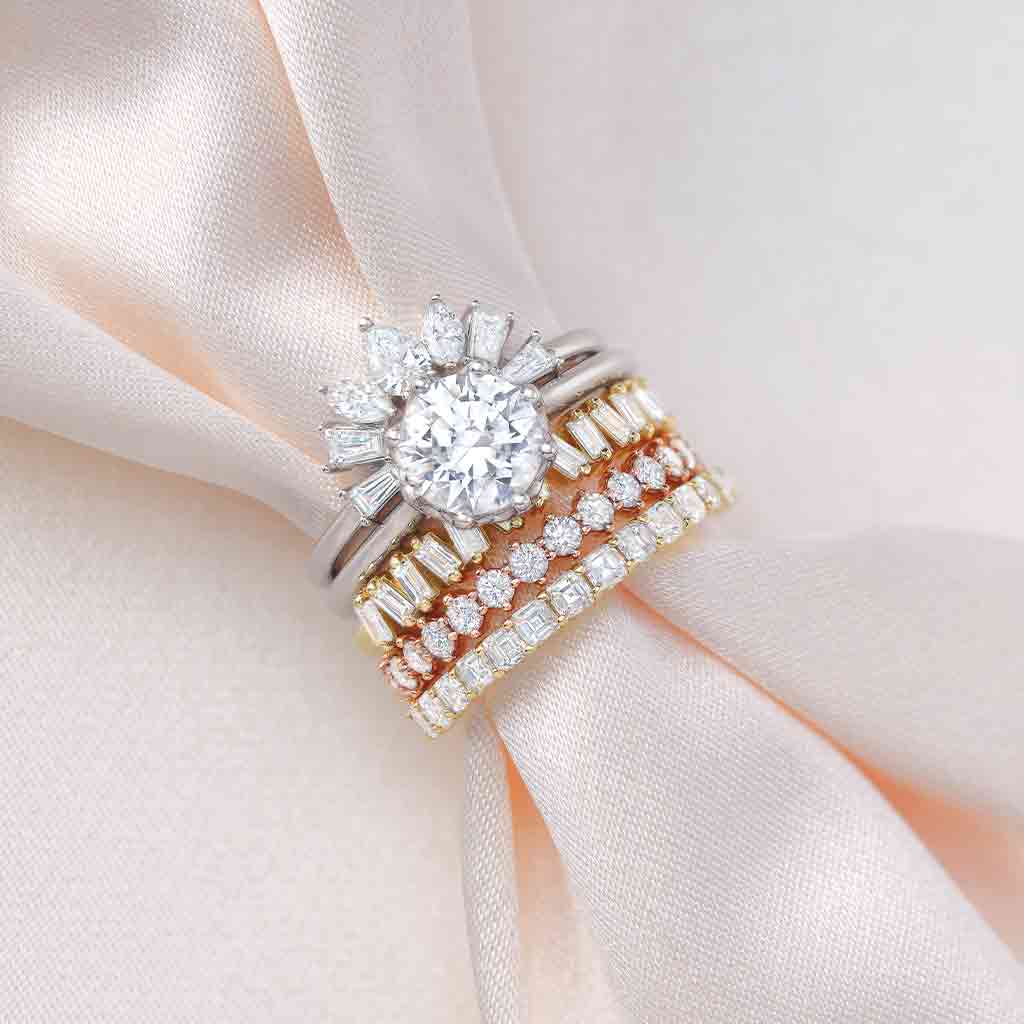 curved diamond wedding band with arabesque design