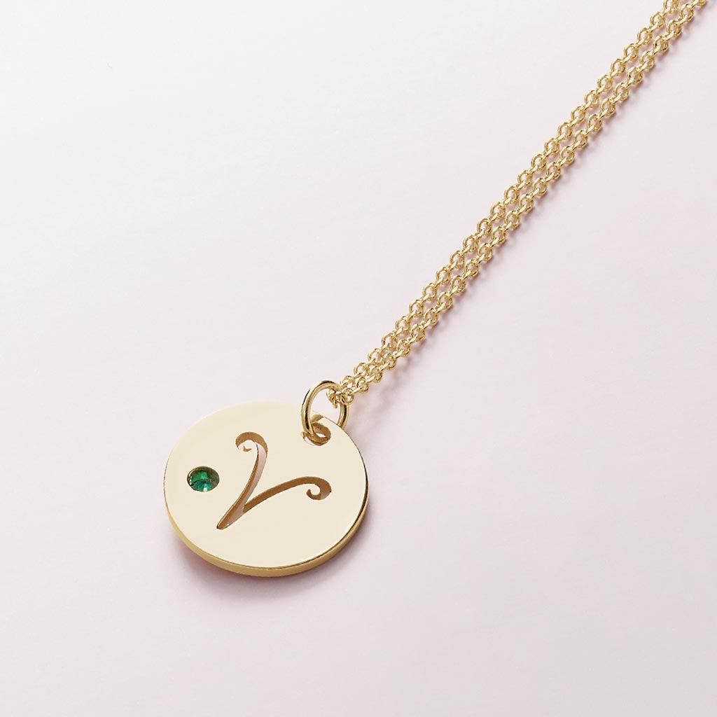 Minimalist aries necklace with zodiac symbol and gemstone charm on gold chain