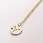 Minimalist aries necklace with zodiac symbol and gemstone charm on gold chain