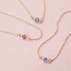 Bezel-set birthstone bracelets displayed together.