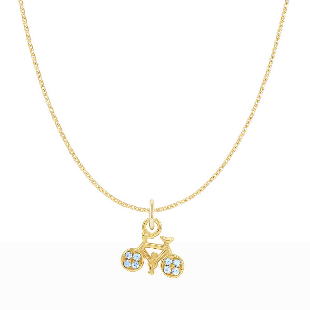Close-up of petite 8.15×7.15 mm bicycle charm with topaz accents on 16" cable chain.