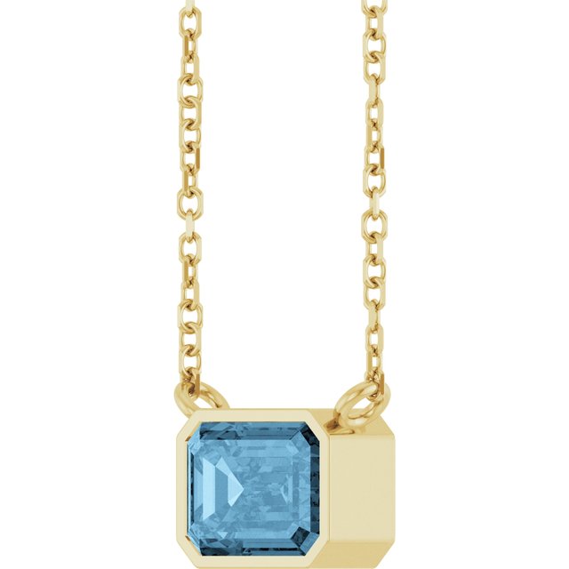 Minimalist birthstone necklace featuring Swiss Topaz