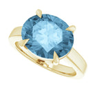 Eco-conscious topaz cocktail ring in 18K gold