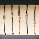 Bracelet Stack with diamond charm skip knot bracelets