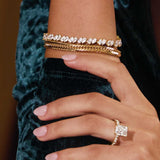 Mixed pear tennis bracelet on model wrist, showing alternating pear layout