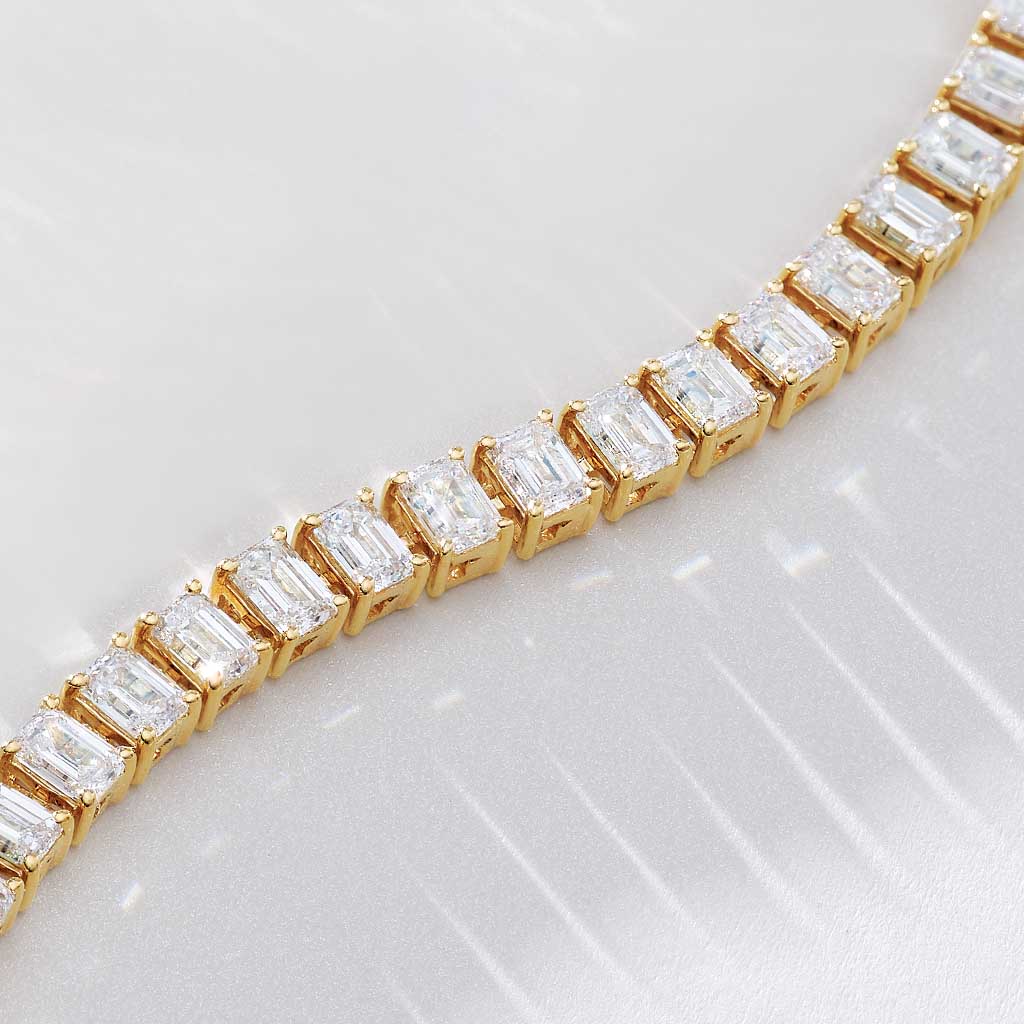Emerald-cut lab-grown diamond tennis bracelet in 14K gold, 42 step-cut stones