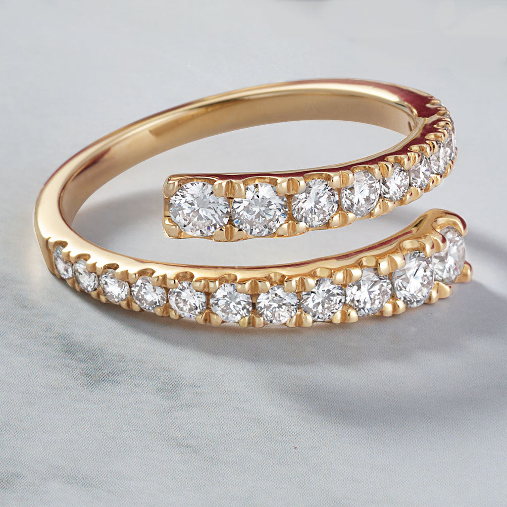 Bypass diamond ring with graduated swirl in 14K gold