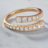 Bypass diamond ring with graduated swirl in 14K gold