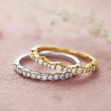 Cavetto diamond band in 14K yellow gold with mixed round diamonds stacked