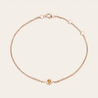 Bezel-set citrine bracelet in 14K rose gold, close-up of stone setting