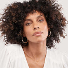 Classic bold gold hoop earrings styled for everyday wear