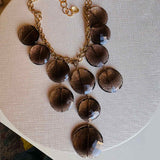 Gemstone bib necklace with cascading faceted smokey topaz discs on 14K gold-fill chain