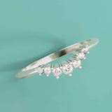 Petite contour diamond band in 14K gold, editorial close-up