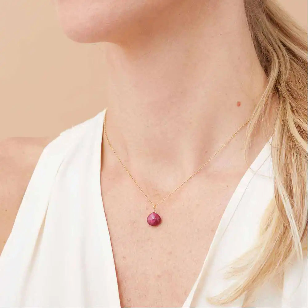 Minimal ruby pendant necklace with deep crimson sparkle on model variant--14K-rose-gold