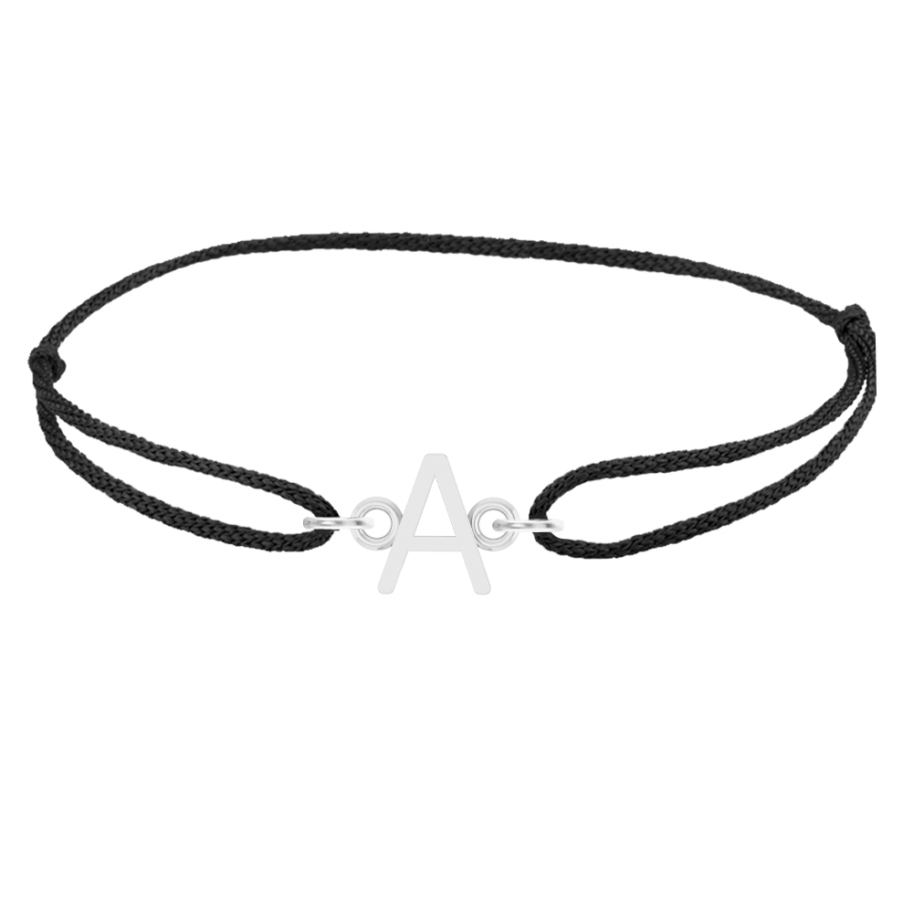 Custom silk thread bracelet with silver initial charm on black silk—adjustable slip-knot, handmade in Colorado