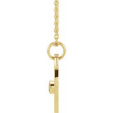 Dainty Gemini necklace with engraved charm and green peridot accent side view