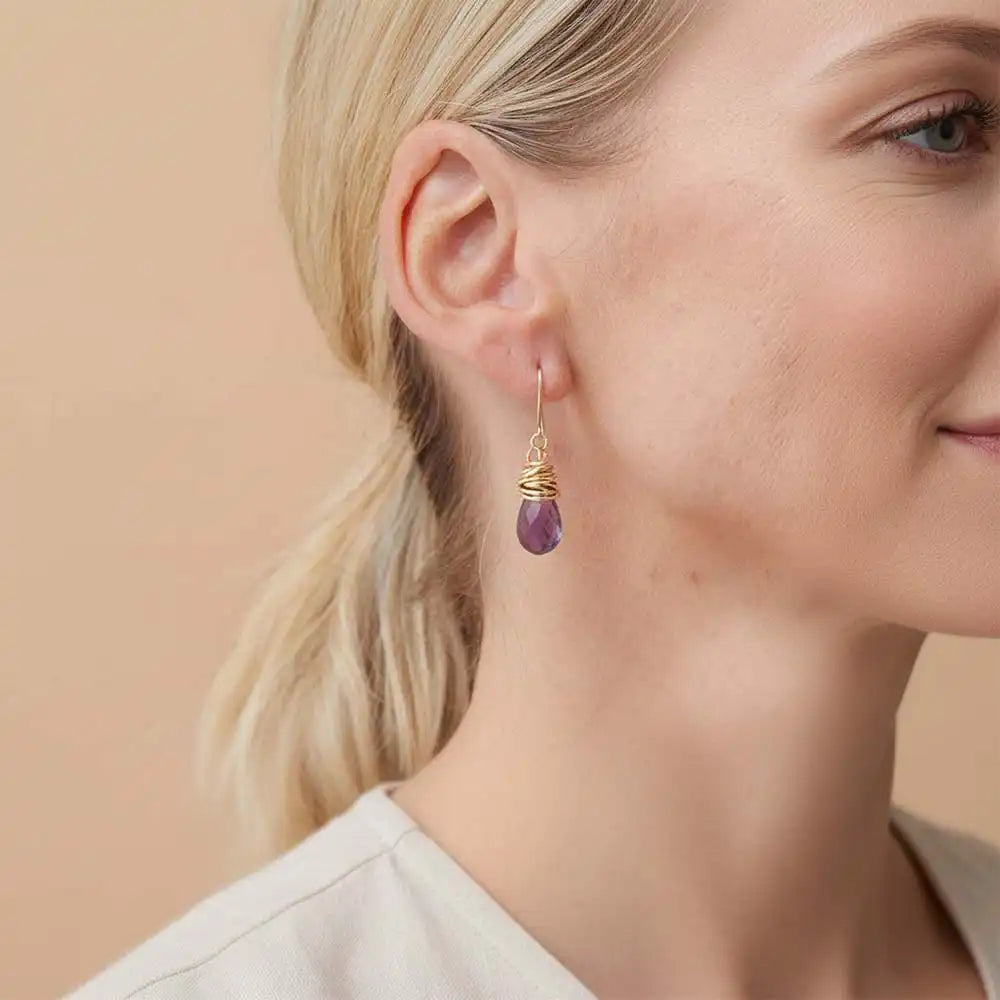 Close-up of natural amethyst bezel dangle earring, showing rich purple stone and handcrafted detail variant--Gold-fill variant--Sterling-silver variant--Amethyst