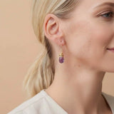 Close-up of natural amethyst bezel dangle earring, showing rich purple stone and handcrafted detail variant--Gold-fill variant--Sterling-silver variant--Amethyst