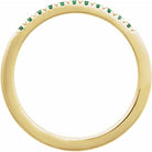 French-set emerald stacking ring in solid 14K yellow gold detailed view