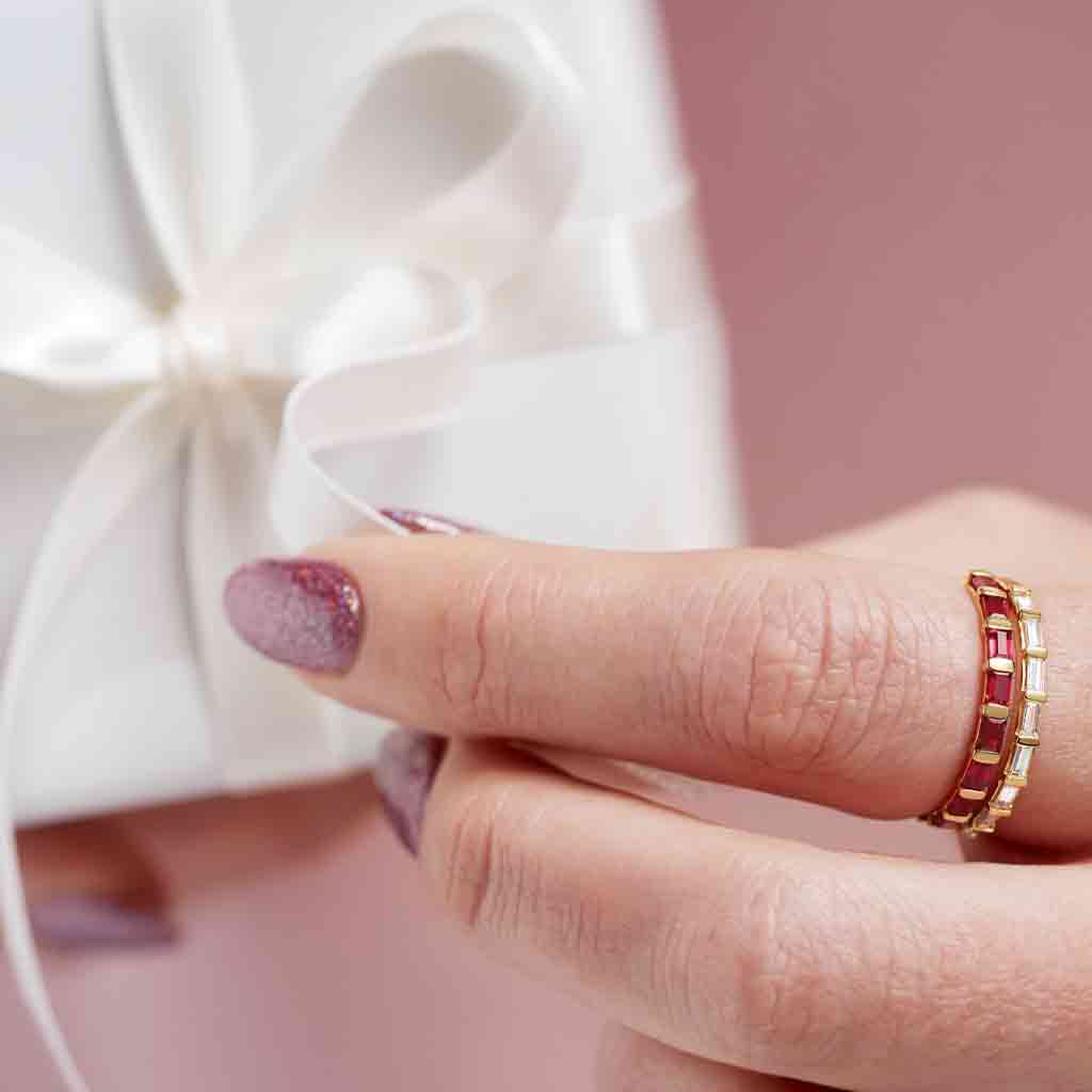 Minimal diamond band featuring baguette-cut diamonds