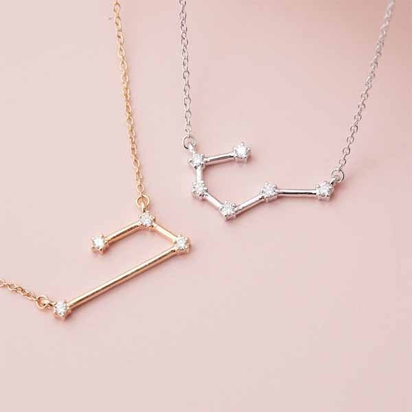 Taurus constellation necklace in 14K gold, on model