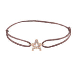 Diamond initial a silk bracelet in 14K rose gold on brown silk