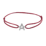 Diamond initial a silk bracelet in 14K white gold on burgundy silk