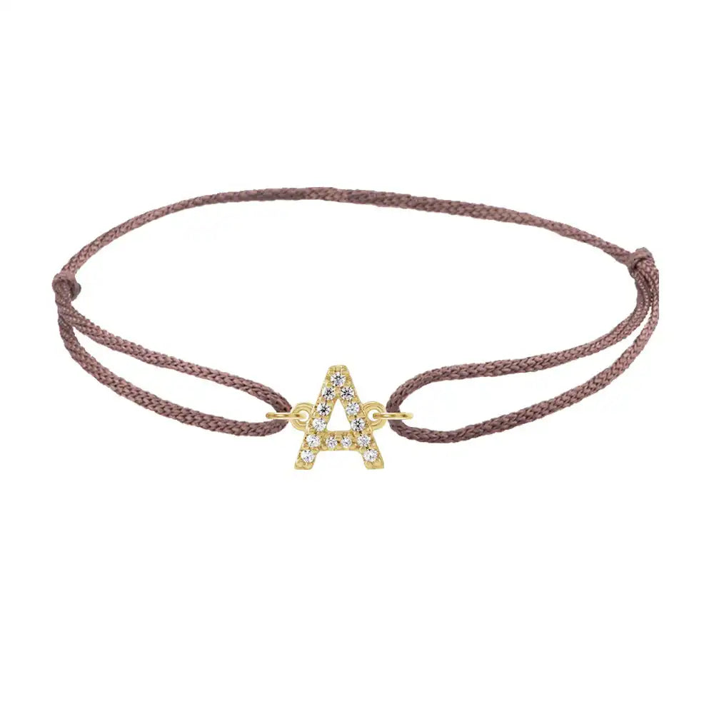 Diamond initial a silk bracelet in 14K yellow gold on brown silk
