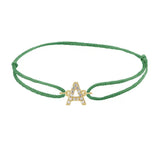 Diamond initial a silk bracelet in 14K yellow gold on emerald silk