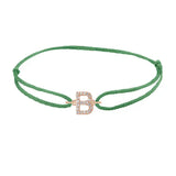 Diamond initial b silk bracelet in 14K rose gold on emerald silk